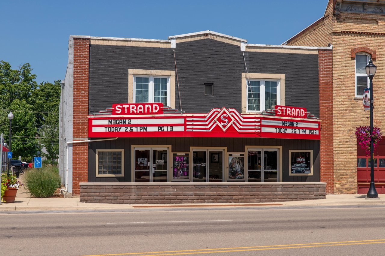 The exterior of the historic Strand Theatre in downtown Paw Paw, Michigan.